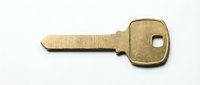 Vintage brass key isolated on white background, ready for design projects, security concepts, and antique-themed compositions.