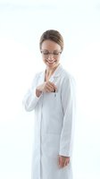Smiling female healthcare professional wearing white lab coat and eyeglasses, adjusting pocket with hand, isolated on white background for medical and clinical use.
