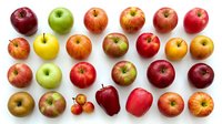 Assorted fresh apples variety isolated on white background, including red, green, and yellow cultivars with natural stems and leaves, suitable for food, nutrition, grocery, and healthy eating design projects.
