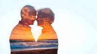 Romantic double exposure silhouette of loving couple against dramatic ocean sunset with crashing waves and vibrant orange sky, artistic wedding photography concept.