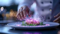 Culinary magic moment with chef sprinkling glowing pink powder over plated dish, creating ethereal sparkles and light effects in upscale restaurant setting.