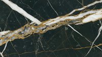 Dark green marble surface with golden and white veining patterns creating elegant natural stone texture for luxury interior design applications.