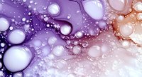 Abstract purple and pink bubble pattern with oil drops and spheres creating dreamy liquid texture for modern backgrounds and creative designs.