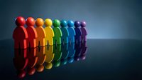 Colorful rainbow human figures standing in row representing diversity, inclusion, teamwork and unity in business workplace with reflective surface.