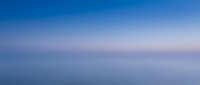 Soft blue gradient background with smooth color transition from deep blue to light purple, creating calm atmospheric mood for presentations and designs.