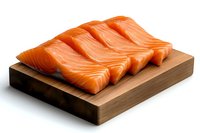 Fresh raw salmon fillets arranged on wooden cutting board against white background, showing vibrant orange color and marbled texture. Ideal for food industry.