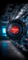 Futuristic circular interface with glowing red text reading "The End" surrounded by digital elements and tech patterns on dark background with blue accents.