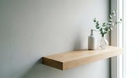 Wooden floating shelf with minimalist decor, featuring glass vase with eucalyptus branches and ceramic bottles against white wall near window for home interior design.
