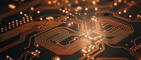 Close-up of illuminated copper circuit board with glowing electronic pathways and warm bokeh lights creating futuristic technology atmosphere.
