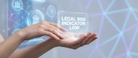 Professional hands presenting legal risk indicator low concept with digital network background for business compliance and risk management solutions.