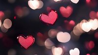 Romantic glowing red hearts floating on dark background with soft bokeh lights creating dreamy Valentine's Day atmosphere. Suitable for greeting cards and love themes.