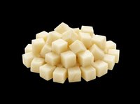 Diced mozzarella cheese cubes isolated on transparent background, ready for food packaging, recipe blogs, culinary design, print-on-demand products and digital food illustrations.