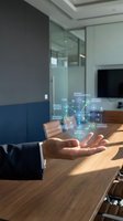 Businessman hand presenting holographic business strategy network with glowing connections in modern office environment for corporate presentations.