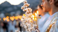 Young Caucasian man in traditional white clothing holding blooming cherry branch against blurred bokeh lights background during spring festival celebration.