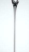 Isolated clear glass spoon with long stem on white background, ready for design use in kitchenware, culinary, and tableware projects.