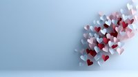 Romantic paper hearts in white, pink and red scattered on light blue background creating elegant corner composition with soft shadows and copy space.