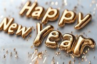 Golden foil balloons spelling Happy New Year with festive confetti on white background for holiday celebration and party decoration.