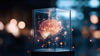 Glowing brain hologram in glass cube with neural connections and light particles floating against blurred bokeh background, representing artificial intelligence.