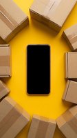 Smartphone surrounded by cardboard delivery boxes on bright yellow background for online shopping and e-commerce mobile applications.
