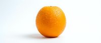 Fresh orange fruit isolated on white background, suitable for food packaging, healthy eating campaigns, and culinary design projects.