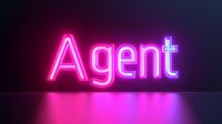 Glowing pink neon sign displaying word Agent on dark background with reflection on surface, modern nightlife urban style lighting effect.