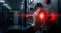 Hand pressing red emergency stop button on industrial control panel in modern factory facility with dramatic lighting and safety protocols.