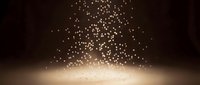 Glowing particles cascade downward creating a magical light effect against dark background, suitable for overlays, transitions, and visual effects projects.