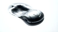 Black boxing glove isolated on white background, ready for sports training, fitness, and athletic design projects.