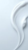 White cream lotion texture swirl on clean background for skincare cosmetic product advertising and beauty industry marketing materials.