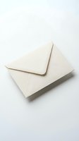 Elegant cream paper envelope on white background, isolated for wedding invitations, greeting cards, and correspondence design projects.