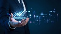 Businessman hand holding glowing performance chart with upward arrow on dark blue background with bokeh lights for business growth and success concepts.