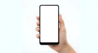 Hand holding modern smartphone with blank white screen mockup isolated on white background for app presentation and digital design projects.