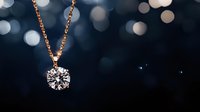 Elegant rose gold necklace with round brilliant diamond pendant against dark bokeh background, showcasing luxury jewelry craftsmanship and sparkling gemstone detail.