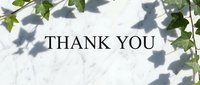 Thank you text on elegant white marble background with green ivy leaves and natural shadows, perfect for greeting cards and social media.