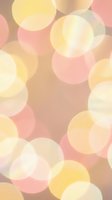 Abstract bokeh circles in soft pink yellow and beige tones creating dreamy overlapping pattern for backgrounds and decorative design projects.