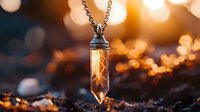 Crystal pendant necklace with warm golden light reflecting through transparent gemstone against blurred bokeh background for jewelry and accessories.