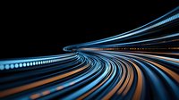 Abstract curved light trails in blue and orange colors creating dynamic motion effect on black background, modern technology concept for digital transformation and speed.