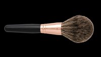 Fluffy powder makeup brush with rose gold ferrule and black handle, isolated on transparent background. Great for beauty clipart, stickers, T-shirt design, and print on demand.