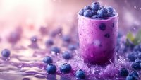Fresh blueberry smoothie in glass with scattered berries and splashing purple liquid on reflective surface against pink bokeh background.