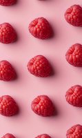 Fresh ripe raspberries arranged in rows on pink background, creating geometric pattern. Minimal food photography style with soft shadows and clean composition.