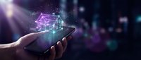 Smart home technology concept with holographic house model floating above smartphone screen displaying connected IoT devices and automation systems.