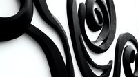 Abstract black curved shapes and swirls on white background creating modern artistic composition for contemporary design projects and decorative elements.