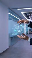 Businessman hands displaying holographic financial data charts and graphs in modern office corridor for business analytics and digital transformation.