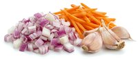 Fresh diced red onion, julienned carrots and garlic cloves isolated on white background for cooking and meal preparation ingredients.