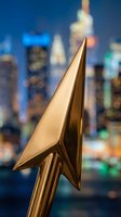 Golden arrow cursor pointing upward against blurred city skyline at night, symbolizing growth, progress, and digital success for web design and technology concepts.