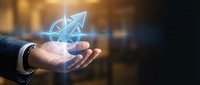 Businessman hand holding glowing holographic email envelope icon with digital network connections for modern communication technology concepts.