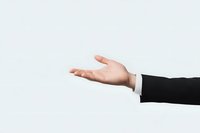 Professional business person extending arm in black suit sleeve showing empty palm gesture against white background, demonstrating presentation pose.