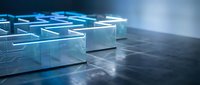 Futuristic glowing maze with blue neon lights on dark surface representing complex problem solving and strategic thinking challenges.