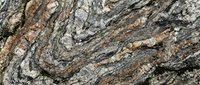 Textured granite stone surface with natural striations, cracks and mineral veining in warm brown, gray and cream tones. Suitable for backgrounds, design elements and architectural projects.