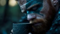 Atmospheric close-up of a bearded man with tribal face paint drinking from an ornate carved wooden cup in moody blue-tinted lighting against dark forest background.